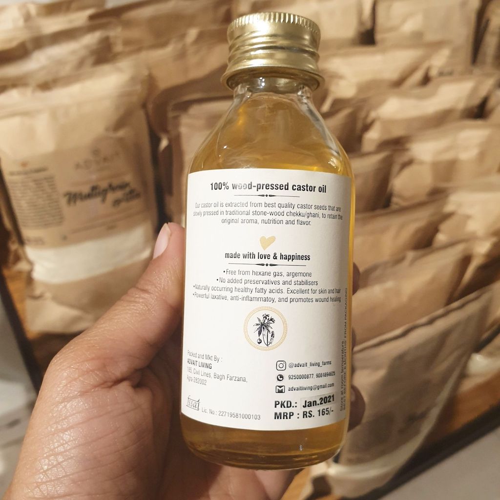 wood pressed castor oil 100ml glass bottle back view