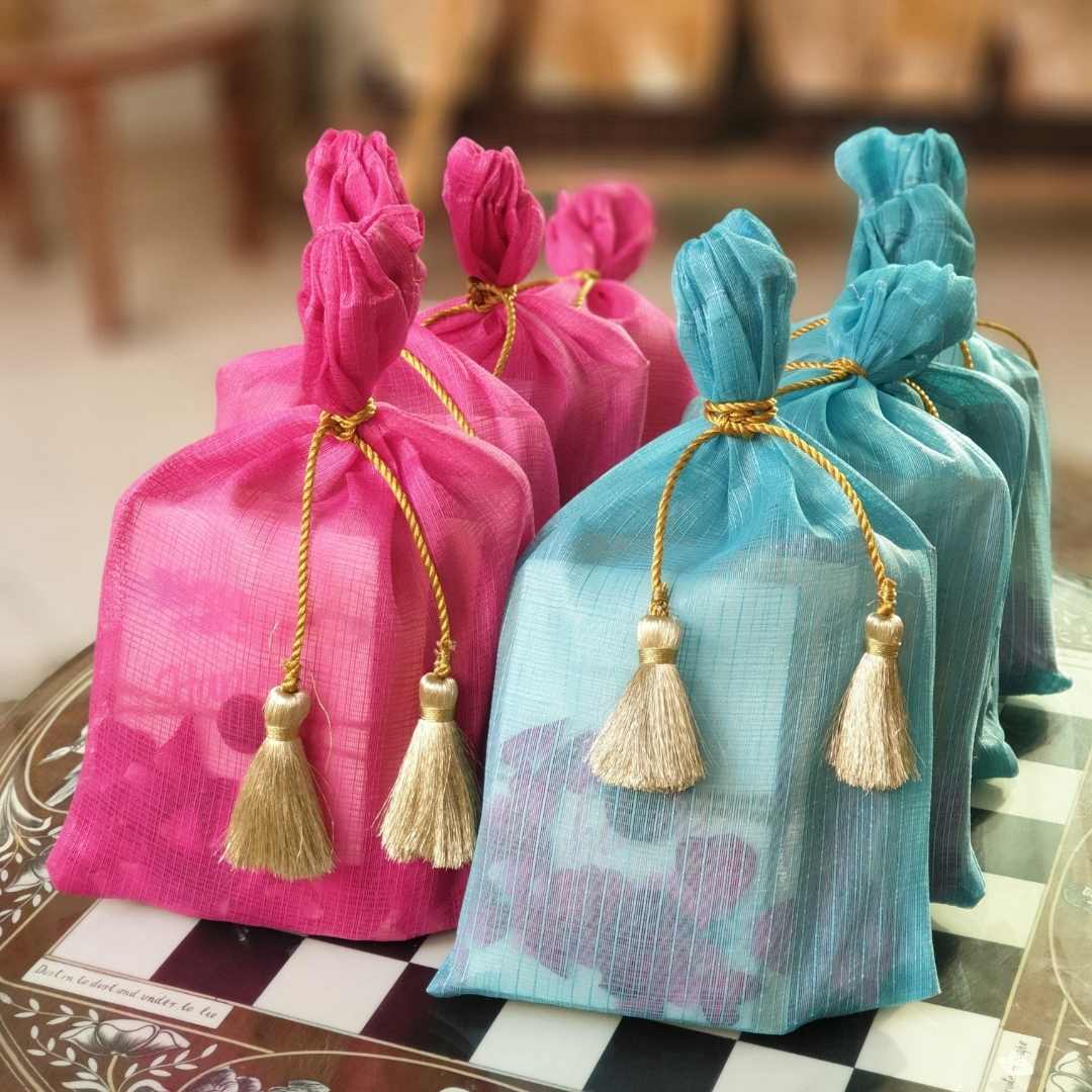 Organza potlis in soft pastel colors Size 7* 9 inch Ideal for gifting  dryfruits / sweets . . . . #mehndigifts #mehndifavorsindia… | Instagram