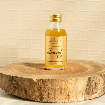 100 ml glass bottle of Advait Living Cold-Pressed Sweet Almond Oil
