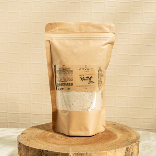 300g packet of Advait Living Multi Millet Atta made from 6 whole grains and seeds.