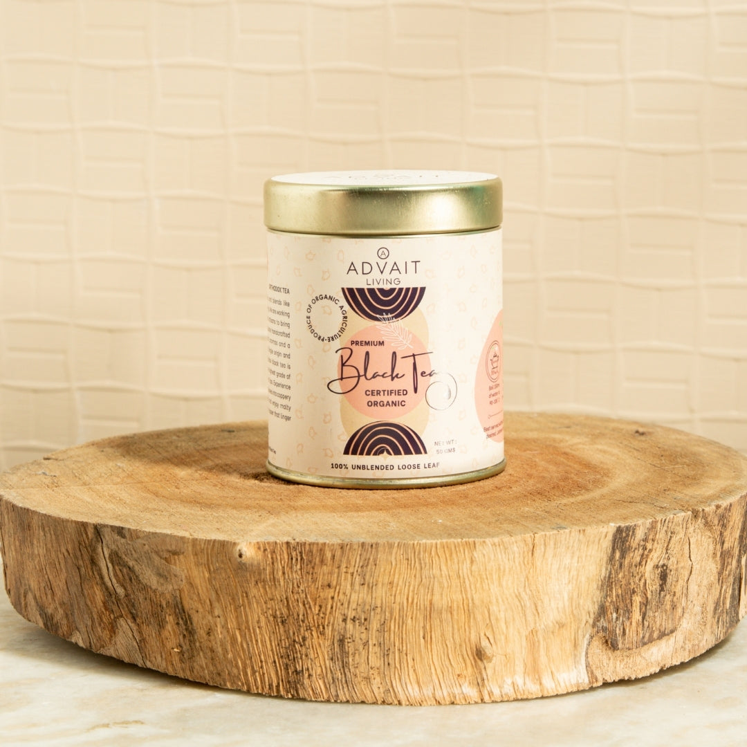 A 50 gm tin of Advait Living Premium Black Tea. Certified Organic, 100% Unblended Loose-Leaf Tea.