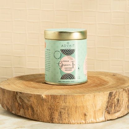 A 50 gm tin of Advait Living Premium Green Tea. Certified Organic, 100% Unblended Loose-Leaf Tea.