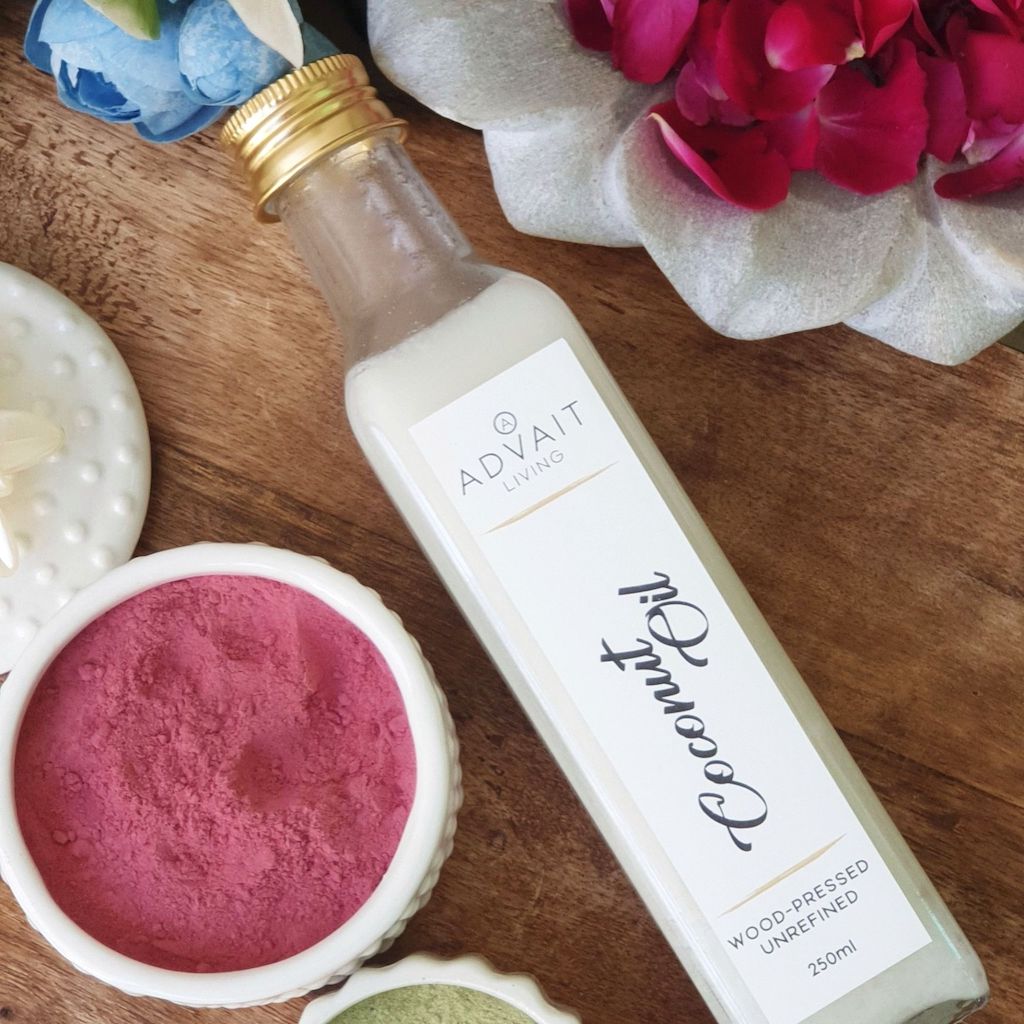 250 ml Wood Pressed Coconut Oil in a glass bottle