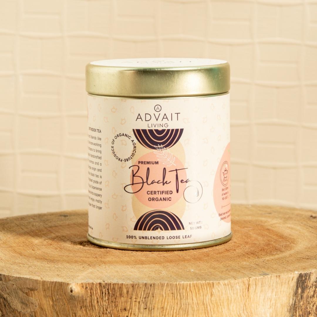 A 50 gm tin of Advait Living Premium Black Tea. Certified Organic, 100% Unblended Loose-Leaf Tea.